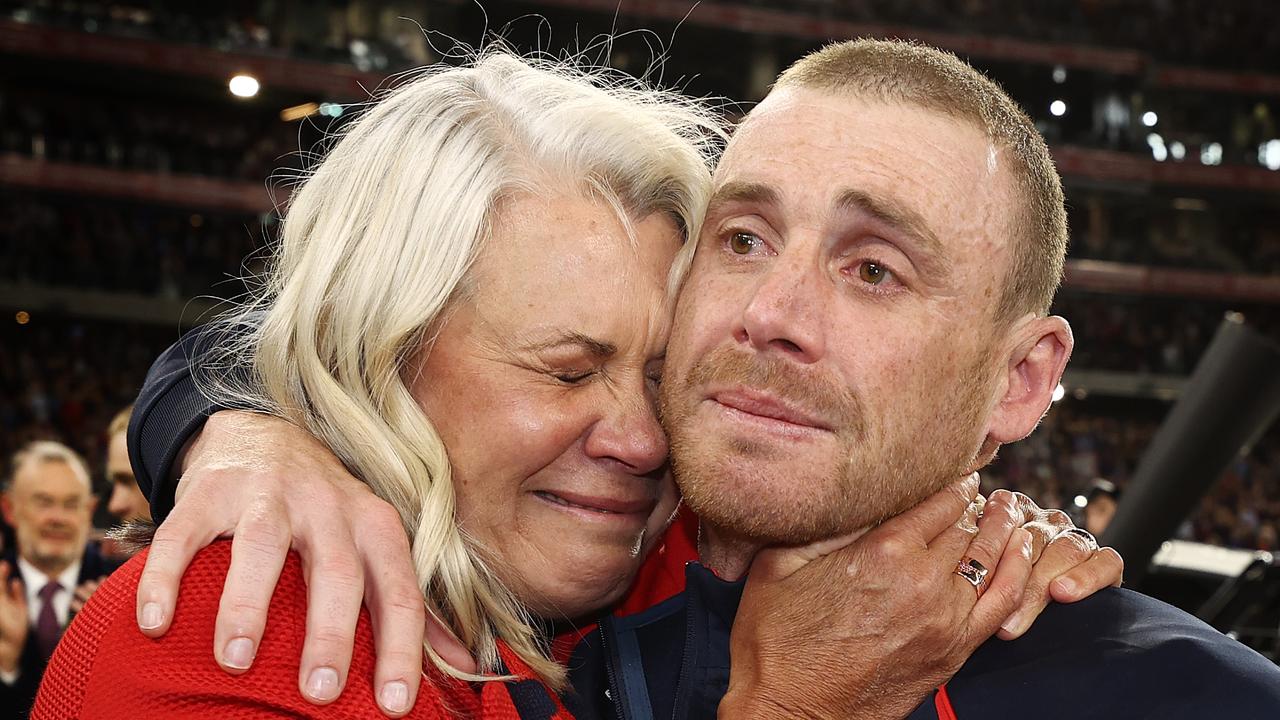 PERTH. 25/09/2021. AFL Grand Final. Melbourne vs Western Bulldogs at Optus Stadium, Perth. . An emotional Simon Goodwin, senior coach of the Demons hugs president Kate Roffey after game. Photo by Michael Klein