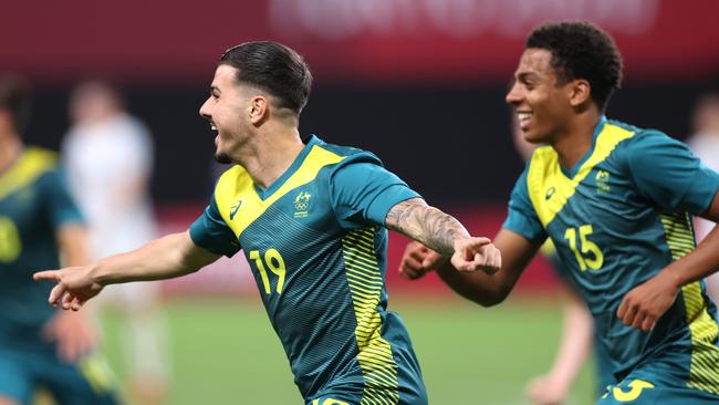 SAPPORO, JAPAN – JULY 22: Marco Tilio #19 of Team Australia celebrates after scoring their side's second goal during the Men's First Round Group C match between Argentina and Australia during the Tokyo 2020 Olympic Games at Sapporo Dome on July 22, 2021 in Sapporo, Hokkaido, Japan. (Photo by Masashi Hara/Getty Images)