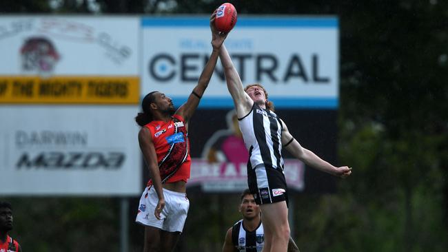 Bombers David Kruse goes up against Tristen Waack in round one of the Men's NTFL 22/23 season. Picture: (A)manda Parkinson