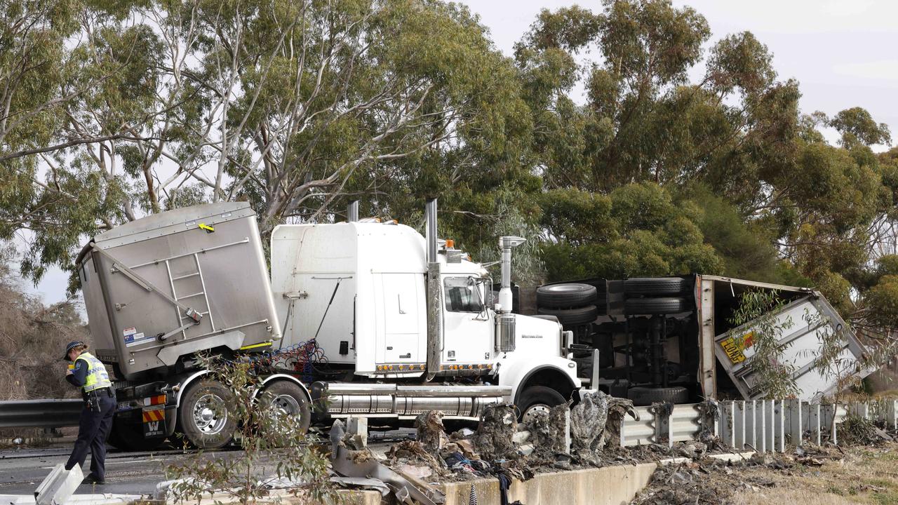 A major crash between a truck and car, has left a driver fighting for life. Picture: Russell Millard Photography