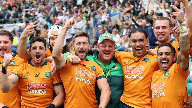 LONDON, ENGLAND – MAY 21: The Australian Team celebrate qualifying for the Olympics during Day Two of The HSBC London Sevens at Twickenham Stadium on May 21, 2023 in London, England. (Photo by Luke Walker/Getty Images)