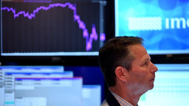 Investors and super fund members pressed “sell” in March 2020. Photo: Johannes Eisele/AFP