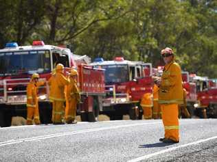 Volunteer fire crews plan containment lines on the Mid North Coast. Picture: DAN HIMBRECHTS