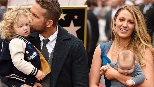 Ryan Reynolds (L) and Blake Lively pose with their daughters as Reynolds is honoured with star on the Hollywood Walk of Fame. Picture: Getty