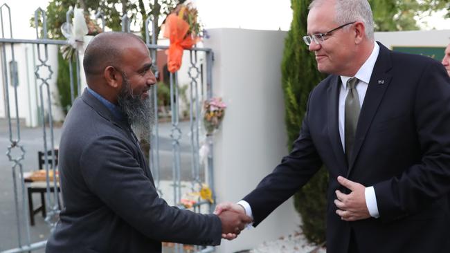 Scott Morrison with a worshipper at the Al Noor Mosque. Picture: Adam Taylor.