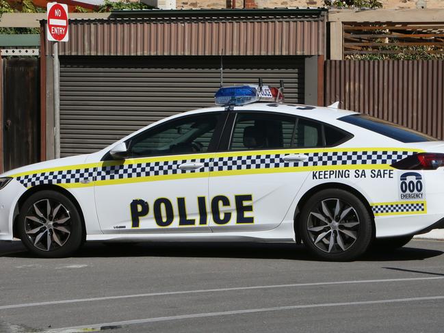 Generic Image A parked South Australian Police Car at a Unit fire in Glenelg, S.A. (AAP/Emma Brasier)