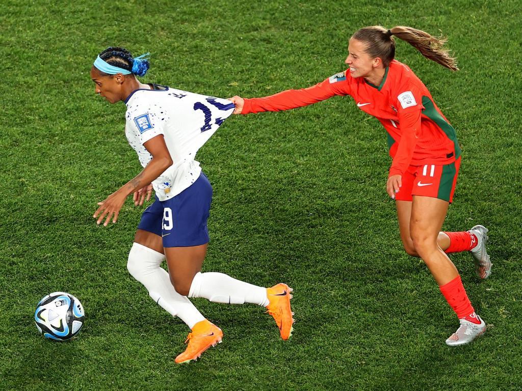 Hang on! Tatiana Pinto of Portugal pulls on the shirt of USA player Crystal Dunn in their sides’ 0-0 draw in New Zealand. Picture: Fiona Goodall/Getty Images