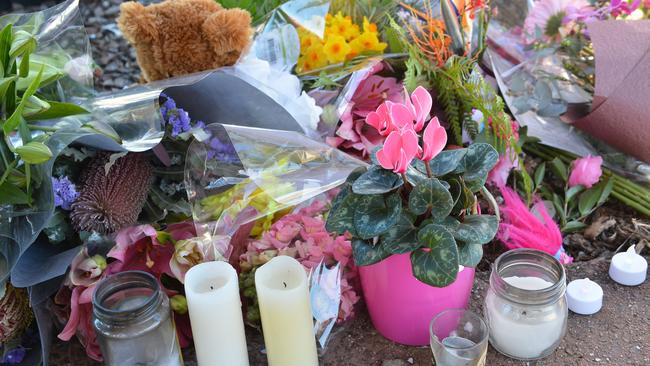 Flowers and messages left at the scene in Nambour after the accident.