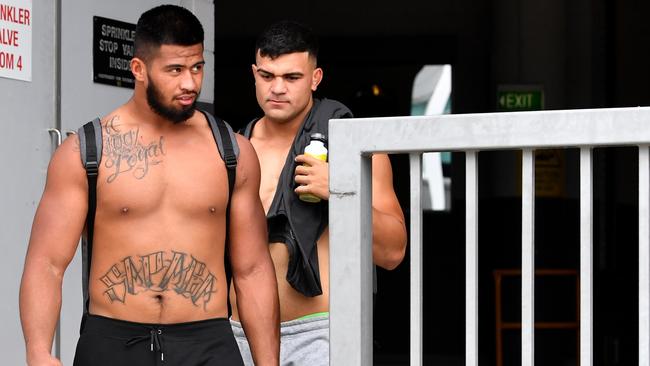 Payne Haas (left) has been in the ear of close friend David Fifita (right) to try and keep him away from the Gold Coast. Picture: AAP Image/Darren England