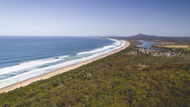 A man is being resuscitated near Moonee Beach, in the same week three other people drowned there. 