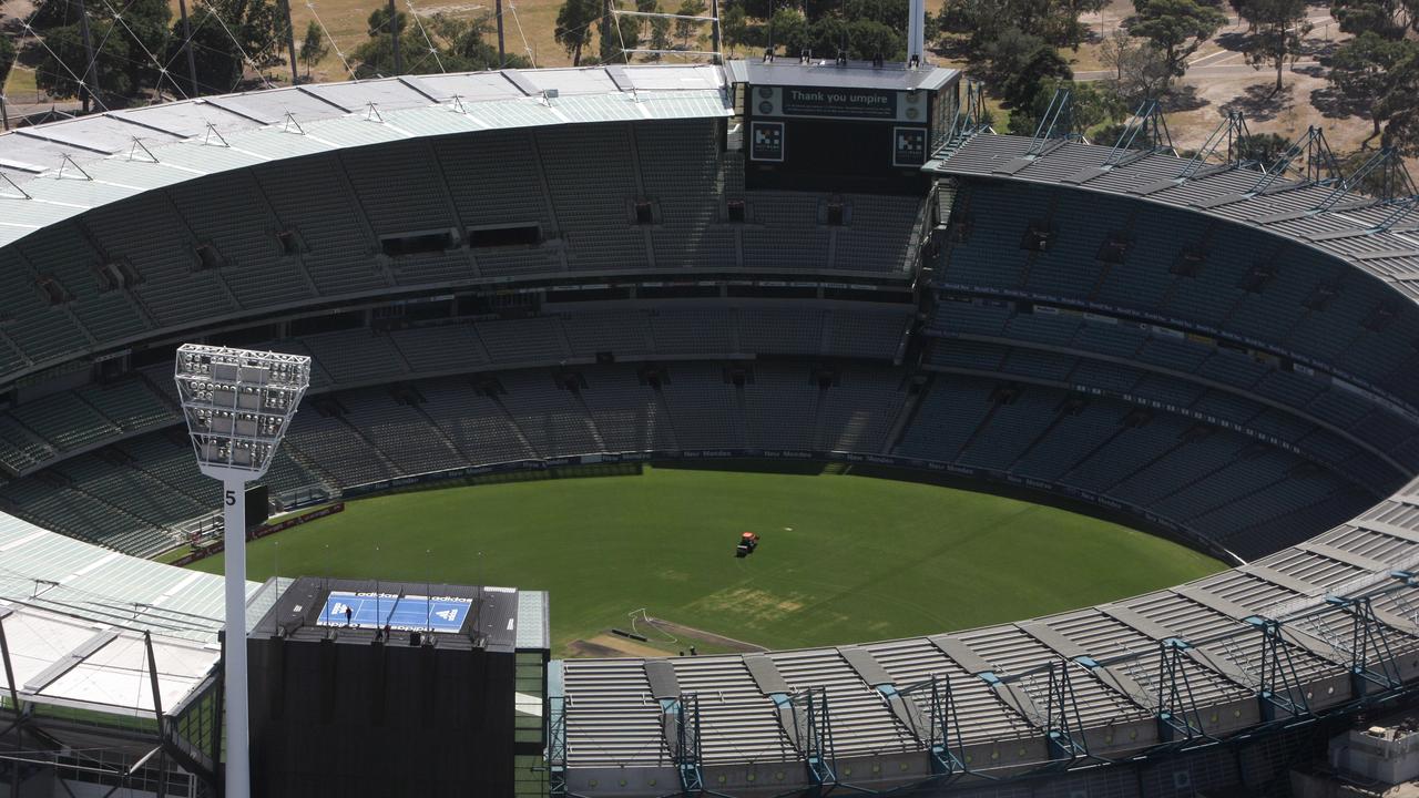 Roof top tennis at the MCG. The scoreboard at the MCG was transformed into a three-quarter size tennis court suspended above the ground with the city skyline as the backdrop.