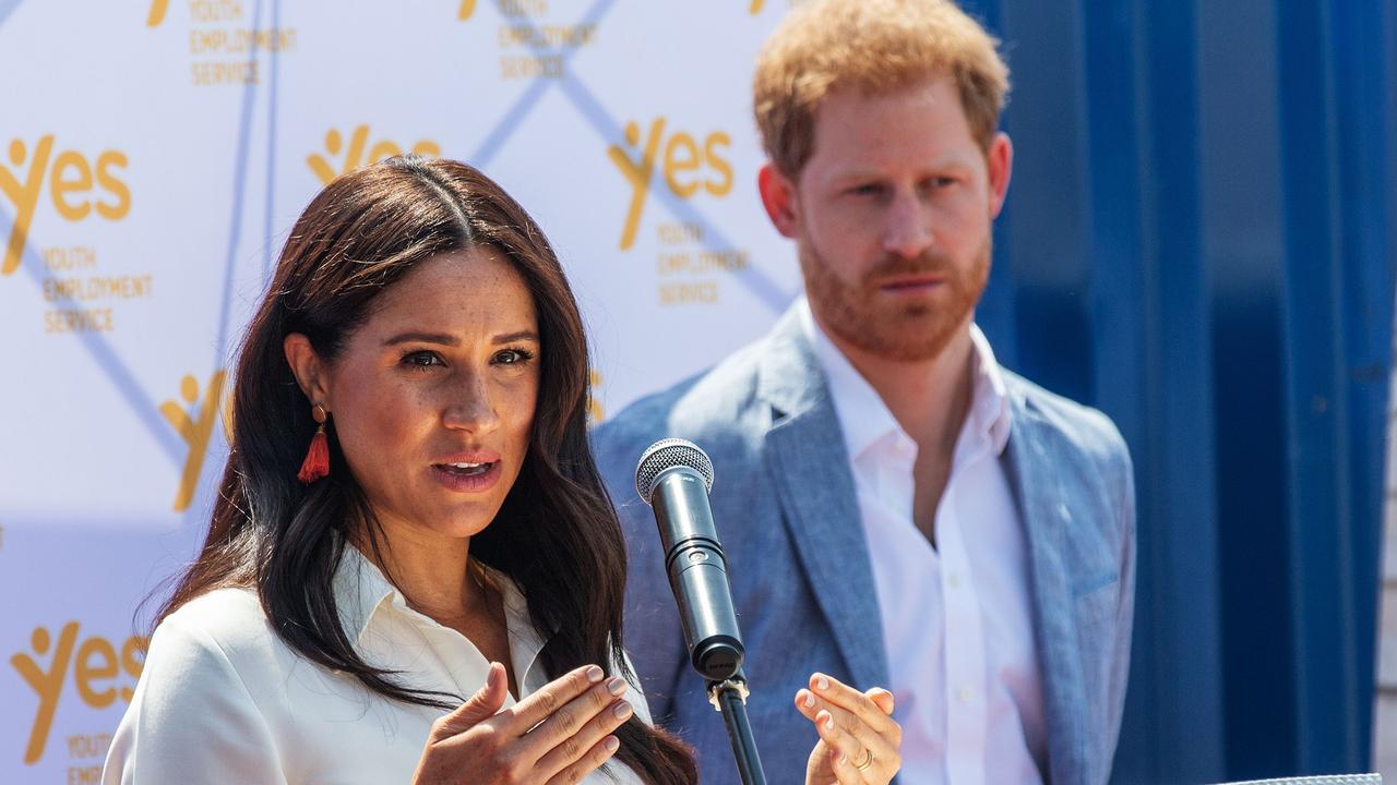 Authors Omid Scobie and Carolyn Durand have travelled the world with Meghan Markle and Prince Harry covering their philanthropic work. Picture: Michele Spatari/AFP.