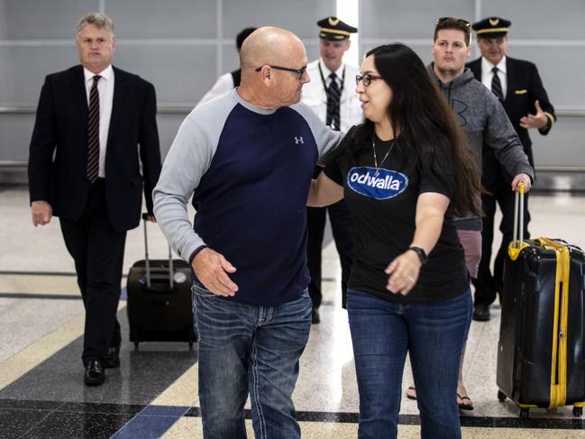 Michael Estorffe, the father of Brenton Estorffe walks with his daughter-in-law upon his arrival at George Bush Intercontinental Airport in Houston. Picture: Scott Dalton