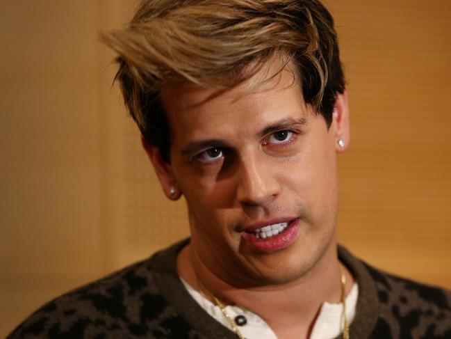 SYDNEY, AUSTRALIA - NOVEMBER 29:  Milo Yiannopoulos reacts during a press conference on arrival at the Sydney International Airport on November 29, 2017 in Sydney, Australia. Yiannopoulos is in Australia for his Troll Academy Tour.  (Photo by Lisa Maree Williams/Getty Images)