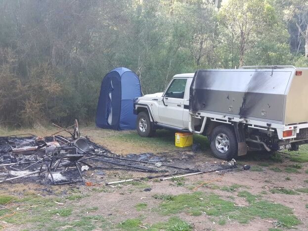 Russell Hill and Carol Clay's burnt-out campsite in the Wonnangatta Valley. Picture: ABC