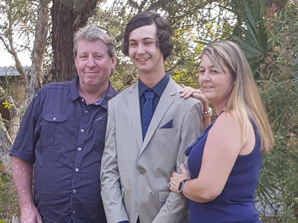 Cohn Evans pictured with his father Jason and mother Dolly. Photos Supplied