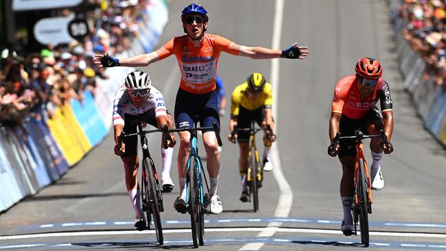 MOUNT LOFTY, AUSTRALIA - JANUARY 21: Stephen Williams of United Kingdom and Team Israel - Premier Tech - Orange Santos Leader's Jersey celebrates at finish line as stage winner ahead of Isaac Del Toro Romero of Mexico and UAE Team Emirates and Jhonatan Narvaez of Ecuador and Team INEOS Grenadiers during the 24th Santos Tour Down Under 2024, Stage 6 a 128.2km stage from Unley to Mount Lofty 648m / #UCIWT / on January 21, 2024 in Mount Lofty, Australia. (Photo by Tim de Waele/Getty Images)