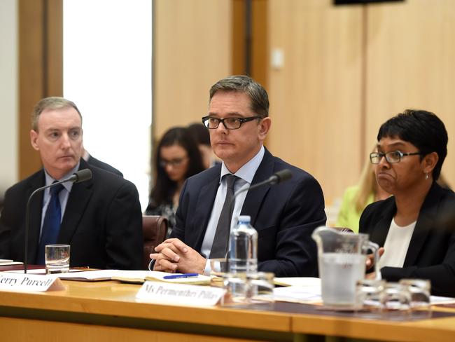 Under pressure. IBM executives during a Senate Estimates hearing into the Census at Parliament House in Canberra. Picture: Lukas Coch.