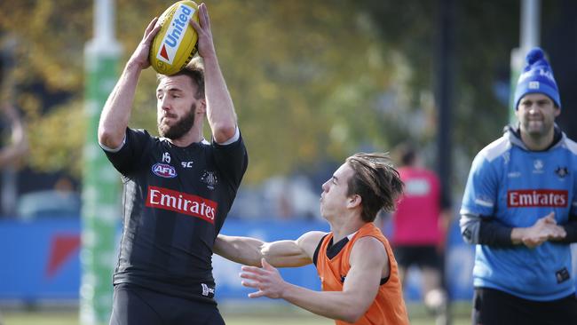 Lynden Dunn at Pies training with Queen’s Birthday debutant Callum Brown. Picture: David Caird