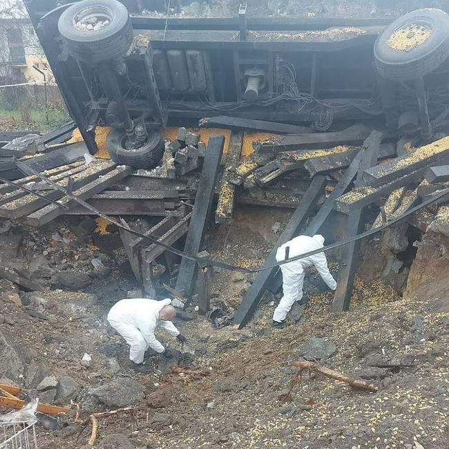 Investigators work after two missiles struck a Polish village. Picture: Polish police