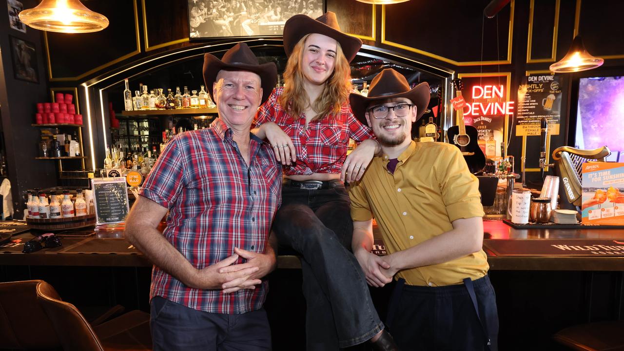 2024 Groundwater Country Music Festival has kicked off in Broadbeach. Terry Paull, Ruby Burgess and Euan Humphries in Den Divine.. Picture Glenn Hampson