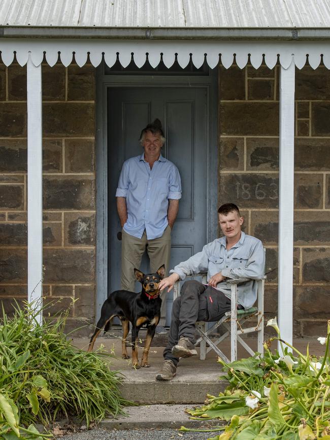 William Cole with his dad, Nick, and Kelpie Digger on their Bookaar farm. Picture: Zoe Phillips