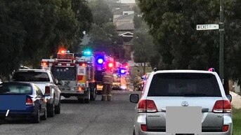 Emergency services at the scene of a fatal house fire in Sunbury.