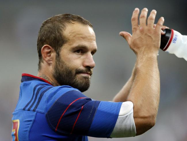 France’s Frederic Michalak celebrates the 25-20 victory.