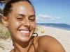 Mia Fevola rocks micro bikini on beach