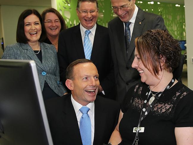 NDIS too costly in today’s economy ... The Prime Minister Tony Abbott opens NDIS in Geelong. Picture: Mike Dugdale