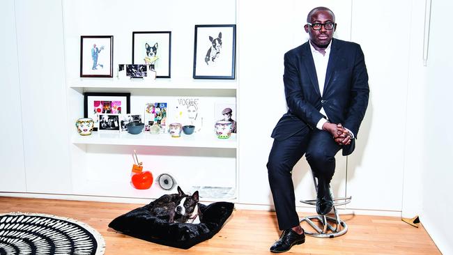 Edward Enninful with his Boston terrier Ru in his London office. Picture: Tom Jackson