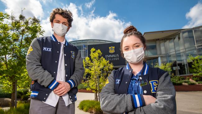 Emmaus Captains Corinne Brennan and Zachary Busch are calling on Dan Andrews to loosen the lockdown so they can celebrate outdoors. Picture: Jason Edwards