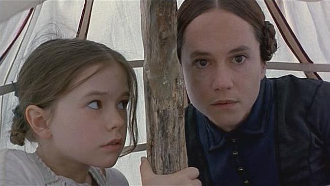 Holly Hunter with Anna Paquin in scene from film "The Piano".