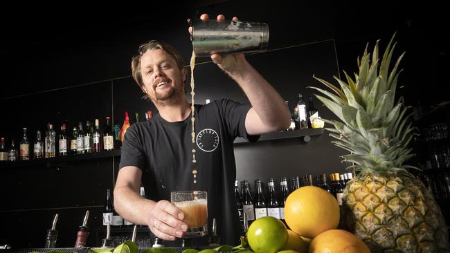 Suzie Luck’s good vibes operator Dean Pitt makes a Jungle Bird cocktail. Picture: CHRIS KIDD