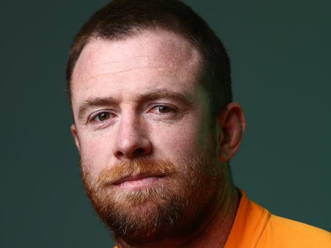 SUNSHINE COAST, AUSTRALIA - JUNE 24:  Jed Holloway poses during the Australian Wallabies 2022 team headshots session on June 24, 2022 in Sunshine Coast, Australia. (Photo by Chris Hyde/Getty Images for Rugby Australia)