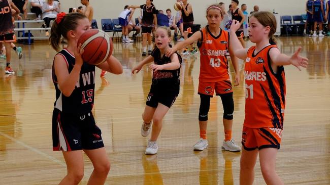 Norwood Flames girls in action against West Adelaide. Picture: Supplied