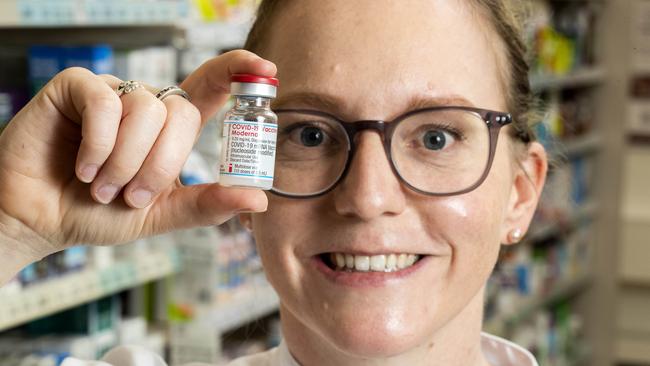 Australian pharmacist Matilda Twist with a vial of Moderna Covid vaccine, which will be used to vaccinate high school students across the Far North. Picture: Richard Walker