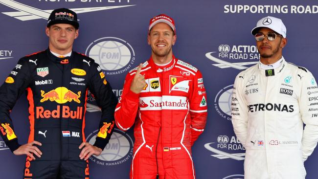 Top three qualifiers Sebastian Vettel of Germany and Ferrari, Max Verstappen of Netherlands and Red Bull Racing and Lewis Hamilton of Great Britain and Mercedes GP.