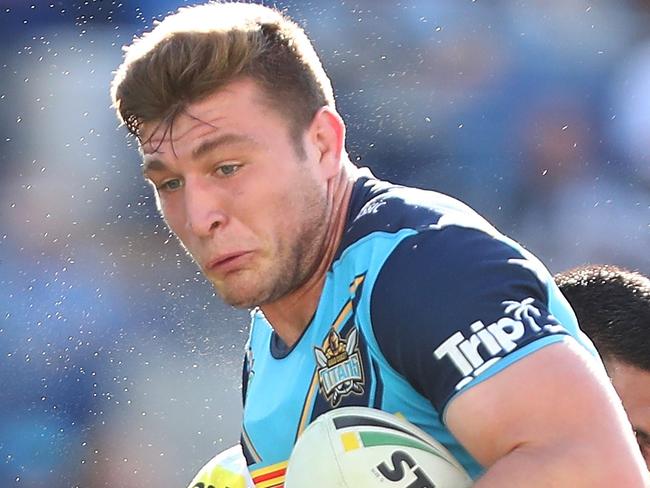 GOLD COAST, AUSTRALIA - AUGUST 11:  Jai Arrow of the Titans is tackeld during the round 22 NRL match between the Gold Coast Titans and the Penrith Panthers at Cbus Super Stadium on August 11, 2018 in Gold Coast, Australia.  (Photo by Chris Hyde/Getty Images)