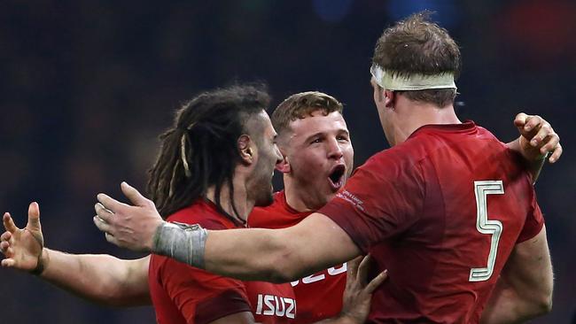 Wales celebrate their win at the Principality Stadium in Cardiff.