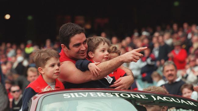 Footballer Garry Lyon with his children doing lap of honour in 1999.