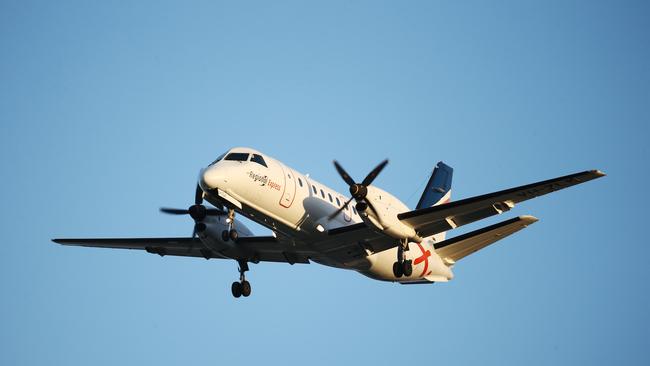 A Regional Express twin turbo propellor light air plane comes in to land at Cairns Airport. PICTURE: BRENDAN RADKE