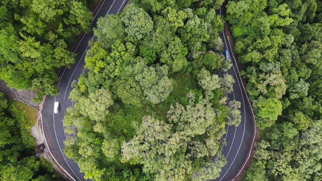 Aerial view of the Kennedy Highway snaking through World Heritage listed rainforest up the McAllister Range. Picture: Brendan Radke