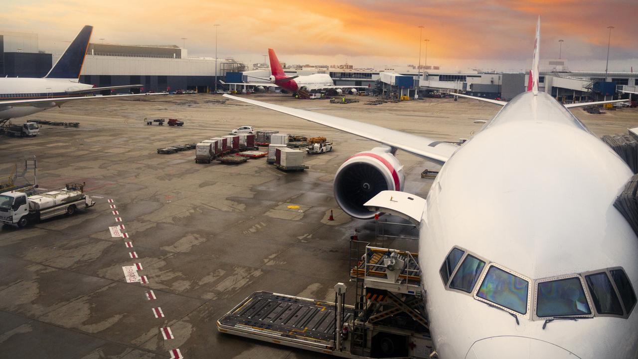 Airplane parked at Sydney International Airport. Picture: iStock