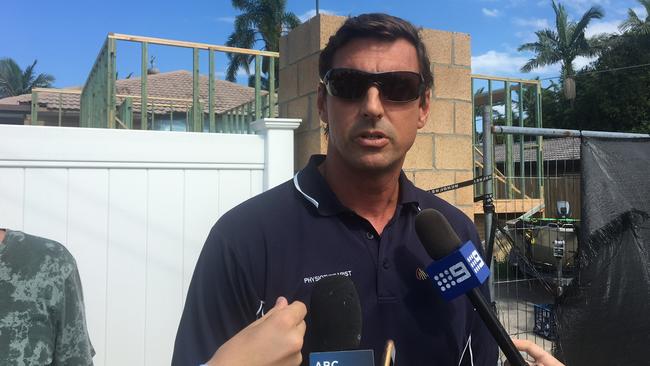 Craig Hackett, brother of Grant Hackett, speaks outside their father's Mermaid Waters home after the 36-year-old champion swimmer was arrested