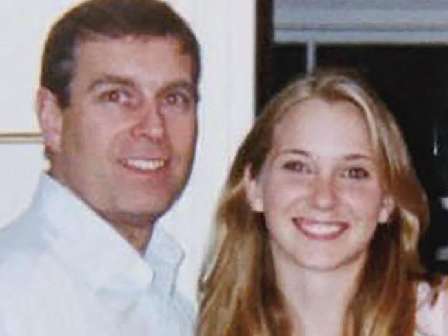 An undated handout photo taken at an undisclosed location and released on August 9, 2021 by the United States District Couty for the Southern District of New York shows (L-R) Prince Andrew, Virginia Giuffre, and Ghislaine Maxwell posing for a photo. - A US judge on January 12, 2022 denied Prince Andrew's plea to dismiss a sexual assault lawsuit brought against the British royal, paving the way for the case to proceed, a court filing showed. (Photo by Handout / US District Court - Southern District of New York (SDNY) / AFP) / RESTRICTED TO EDITORIAL USE - MANDATORY CREDIT "AFP PHOTO / UNITED STATES DISTRICT COURT FOR THE SOUTHERN DISTRICT OF NEW YORK" - NO MARKETING - NO ADVERTISING CAMPAIGNS - DISTRIBUTED AS A SERVICE TO CLIENTS