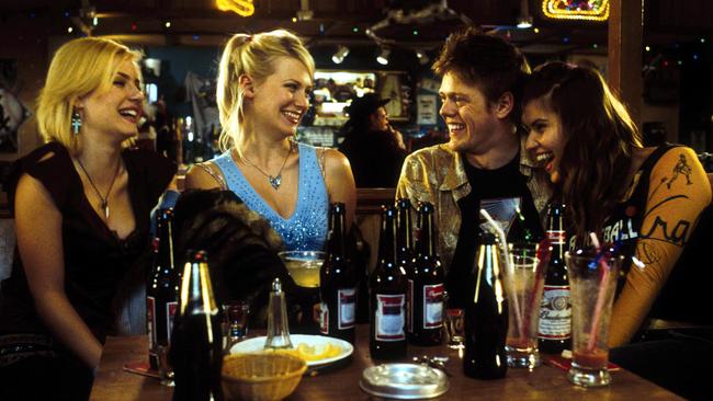 Colin (Kris Marshall) with Stacey (Ivana Miličević), Jeannie (January Jones), and Carol-Anne (Elisha Cuthbert).