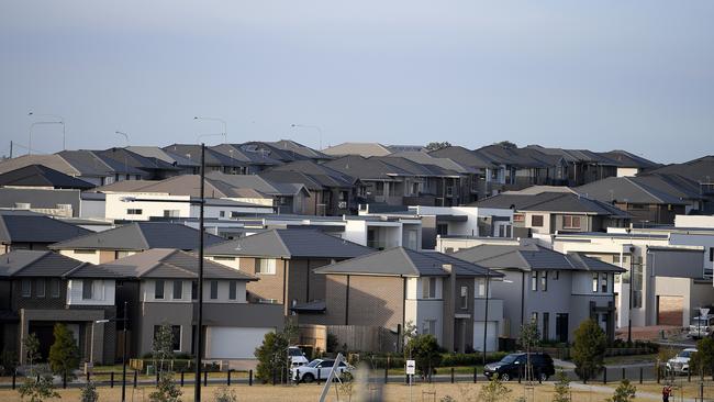 Residential housing is seen in Sydney's west, Thursday, July 26, 2018. Tumbling house prices in Sydney and Melbourne are the main drivers behind the first annual drop in national property prices in six years, a new report shows. (AAP Image/Dan Himbrechts) NO ARCHIVING