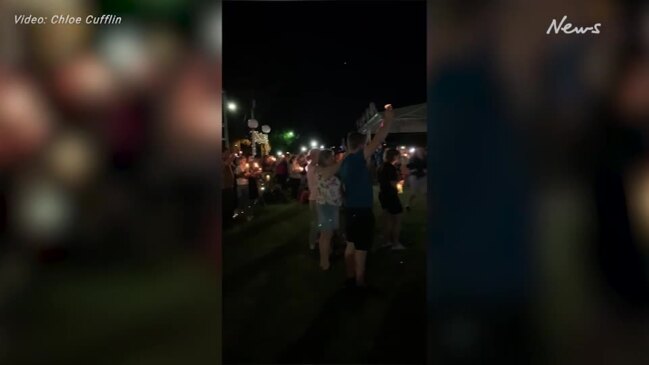 Chinchilla residents hold 1 minute silence during candlelight vigil