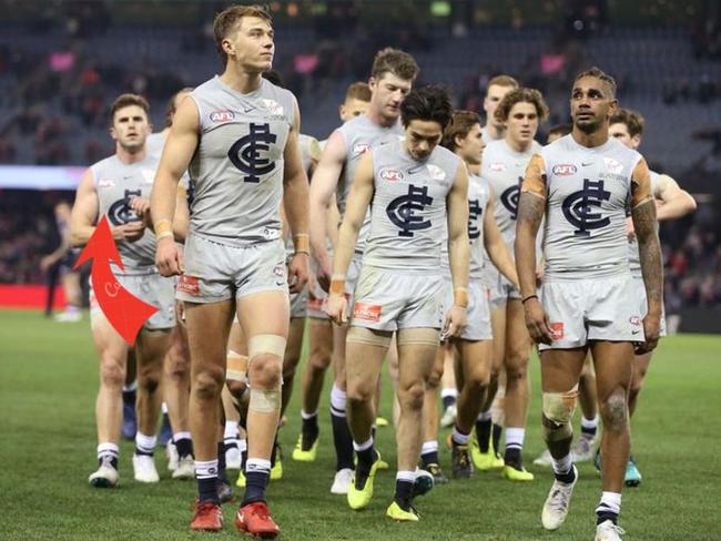 The image that shows Murphy walking off behind Cripps